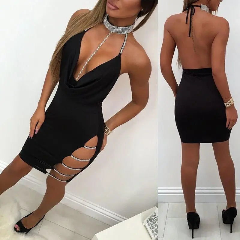 a woman wearing a black dress with a cut out back