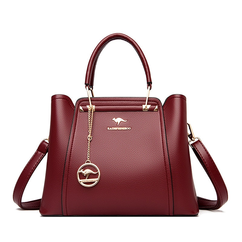 a women's handbag with a metal handle
