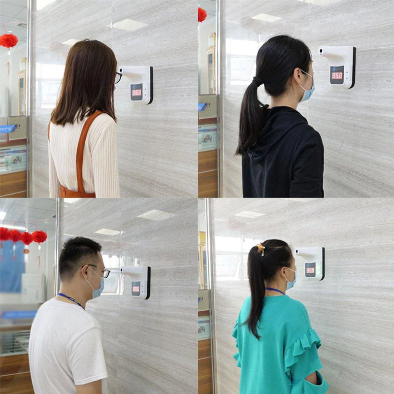 a man and a woman standing in front of a mirror