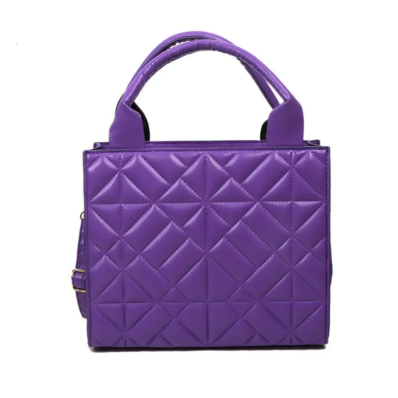 a purple handbag on a white background