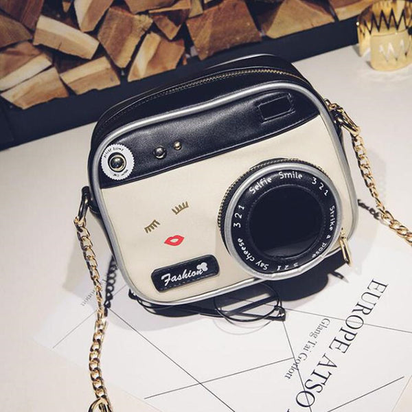 a camera bag sitting on top of a table