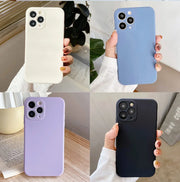 a person holding a phone case in four different colors