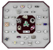 a display case holds a variety of rings